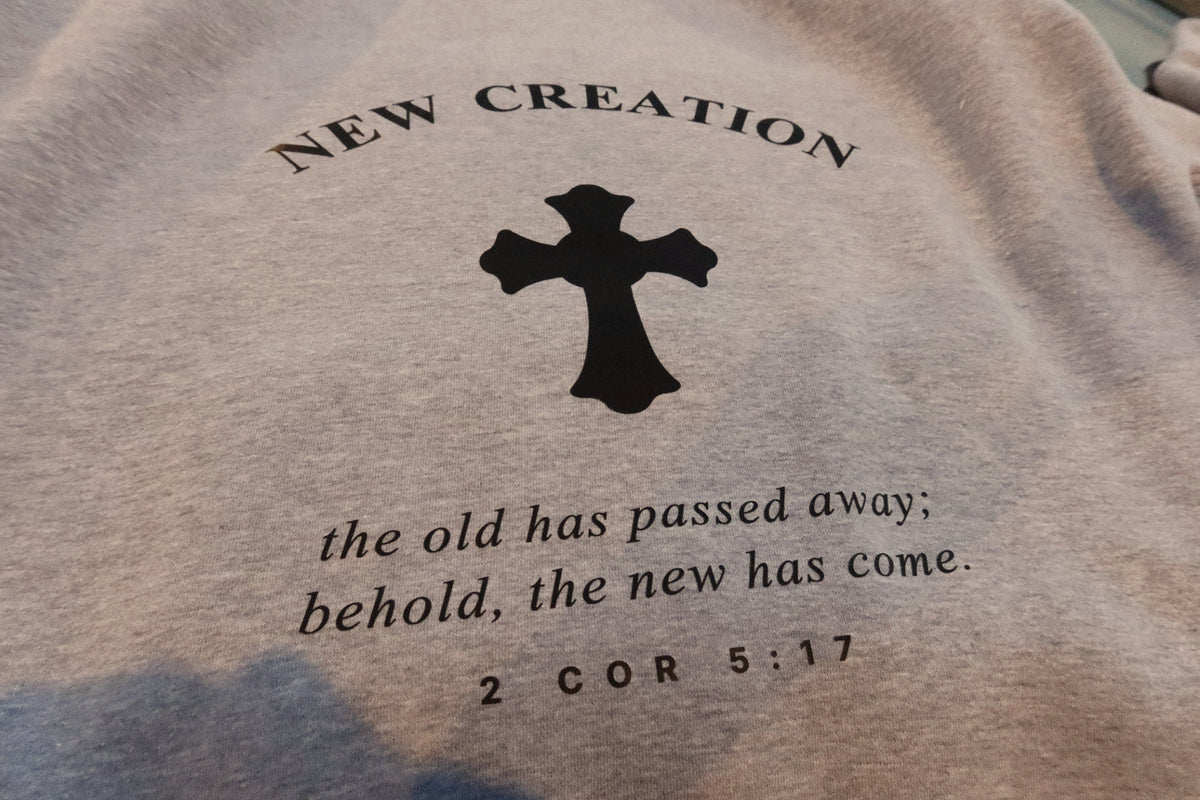 NEW CREATION back print with 2 Cor. 5:17 on heather grey, close