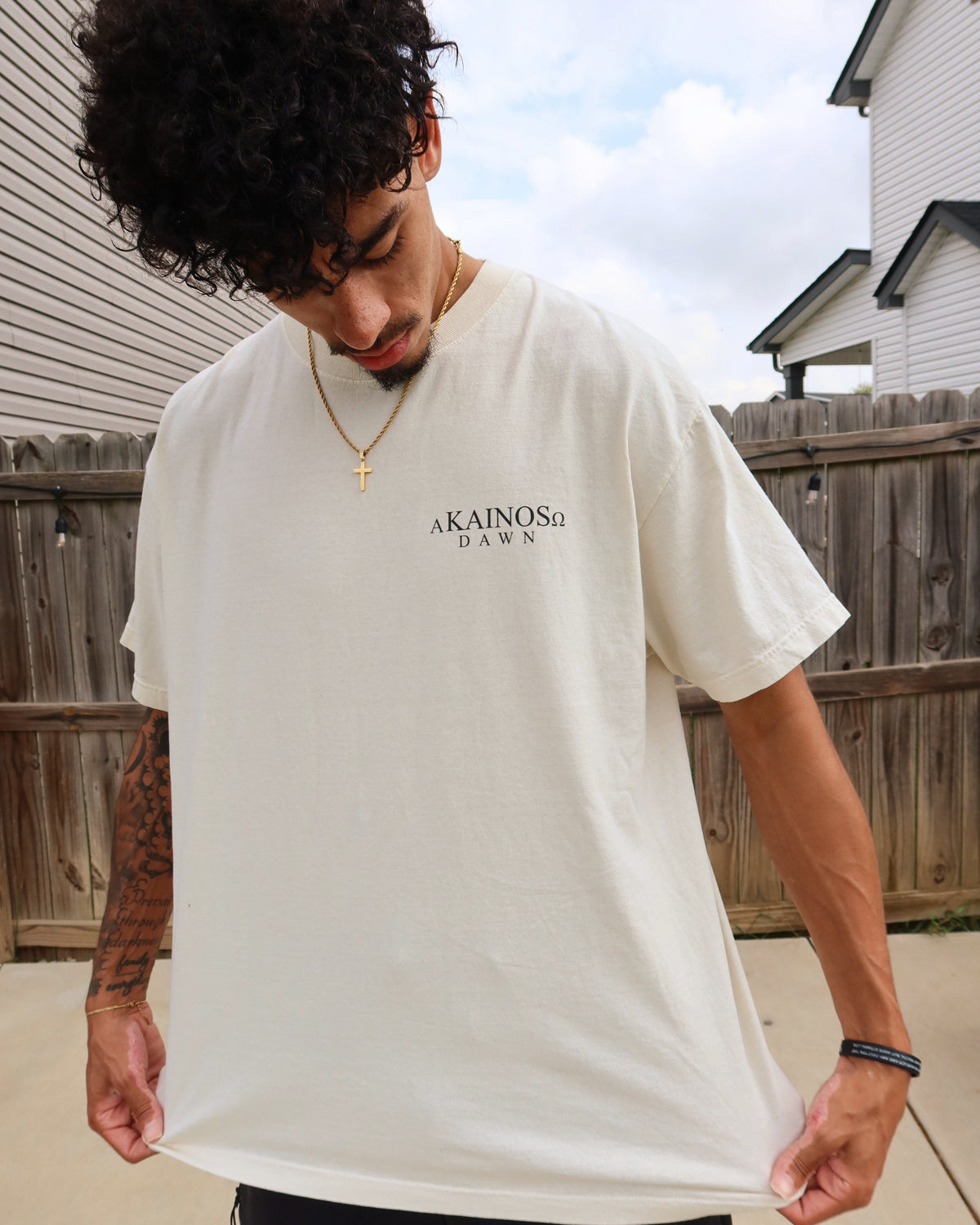 DAWN tee worn, chest lockup close