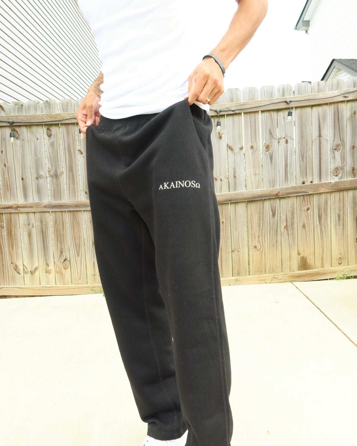 KAINOS sweatpant in black, the lockup on the thigh