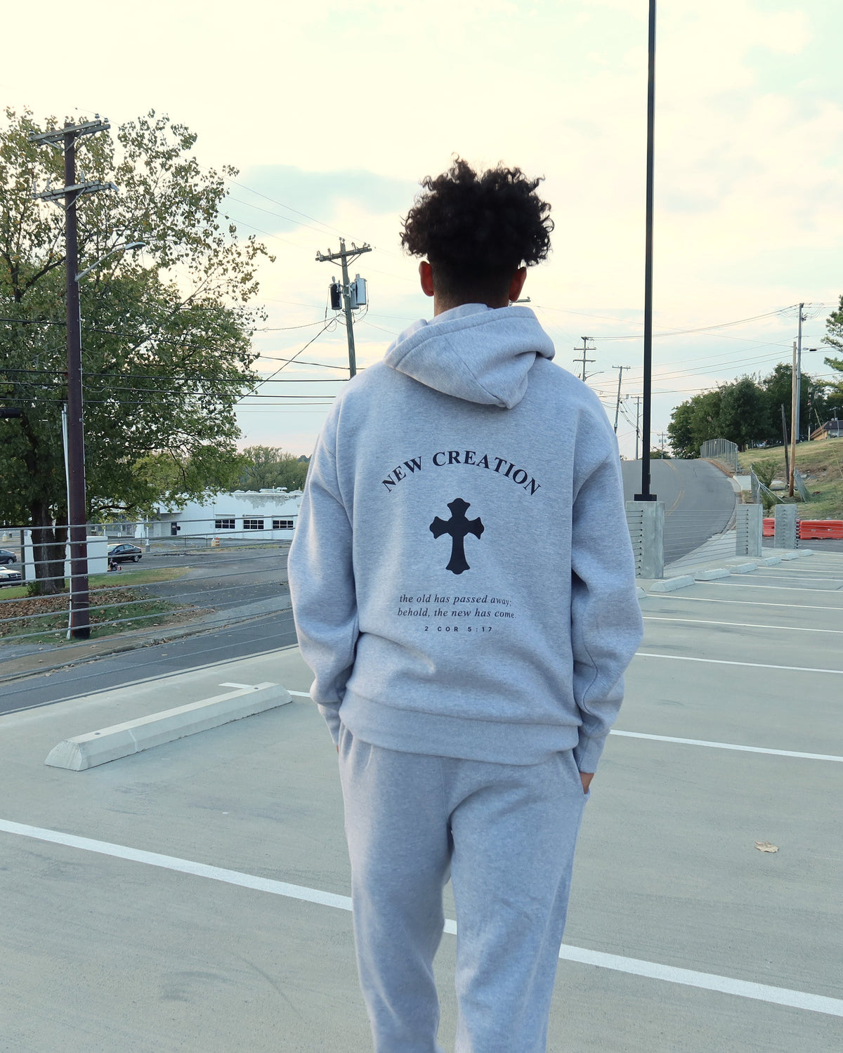 NEW CREATION hoodie in heather grey, worn, back print
