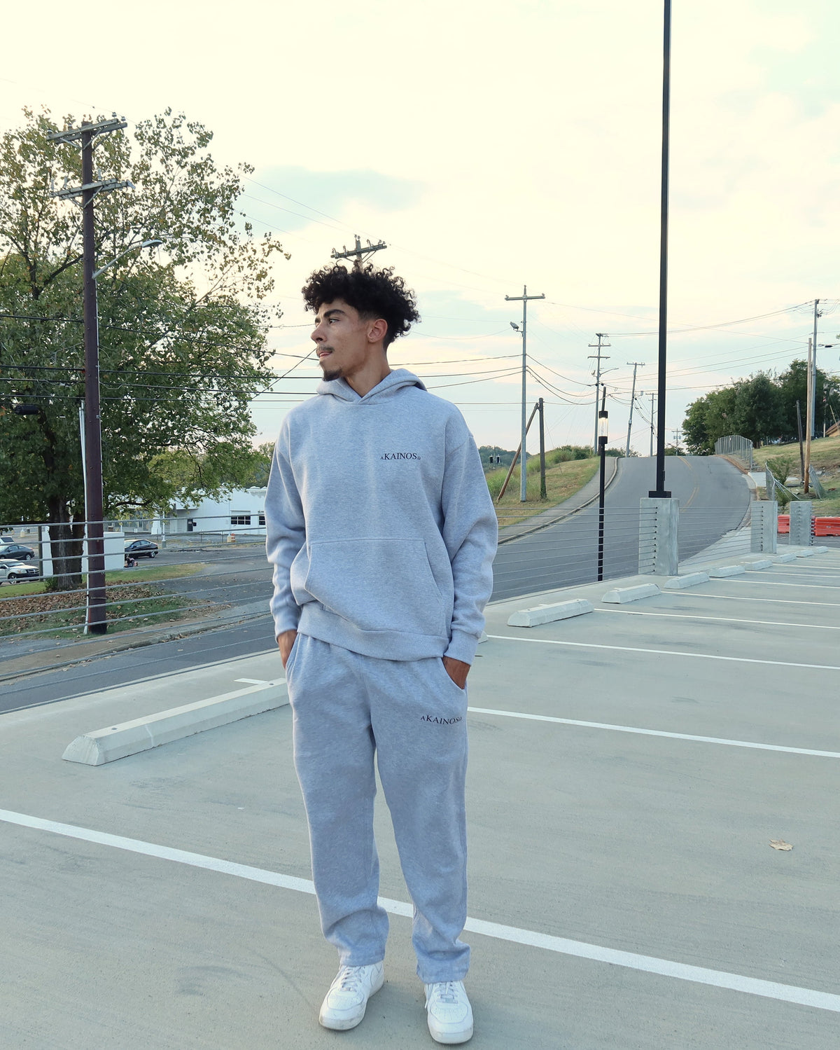 NEW CREATION hoodie in heather grey, worn, front