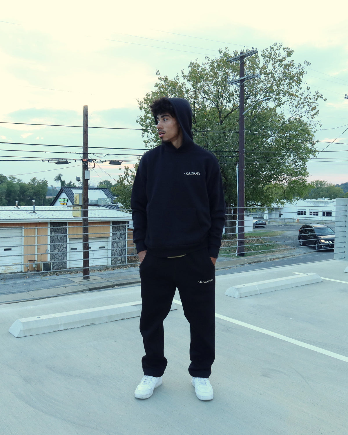 NEW CREATION hoodie in black, hood up