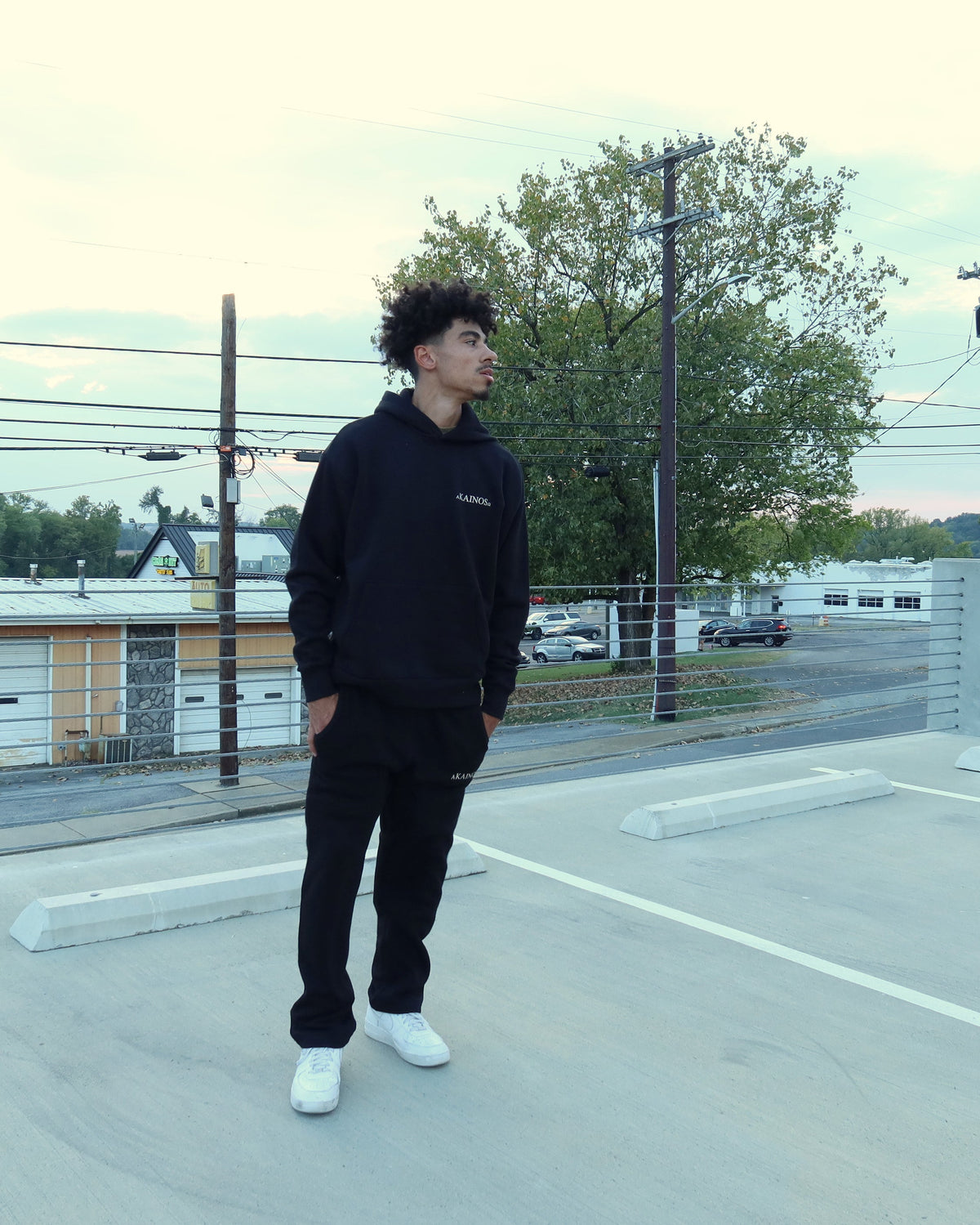 NEW CREATION hoodie in black, side profile