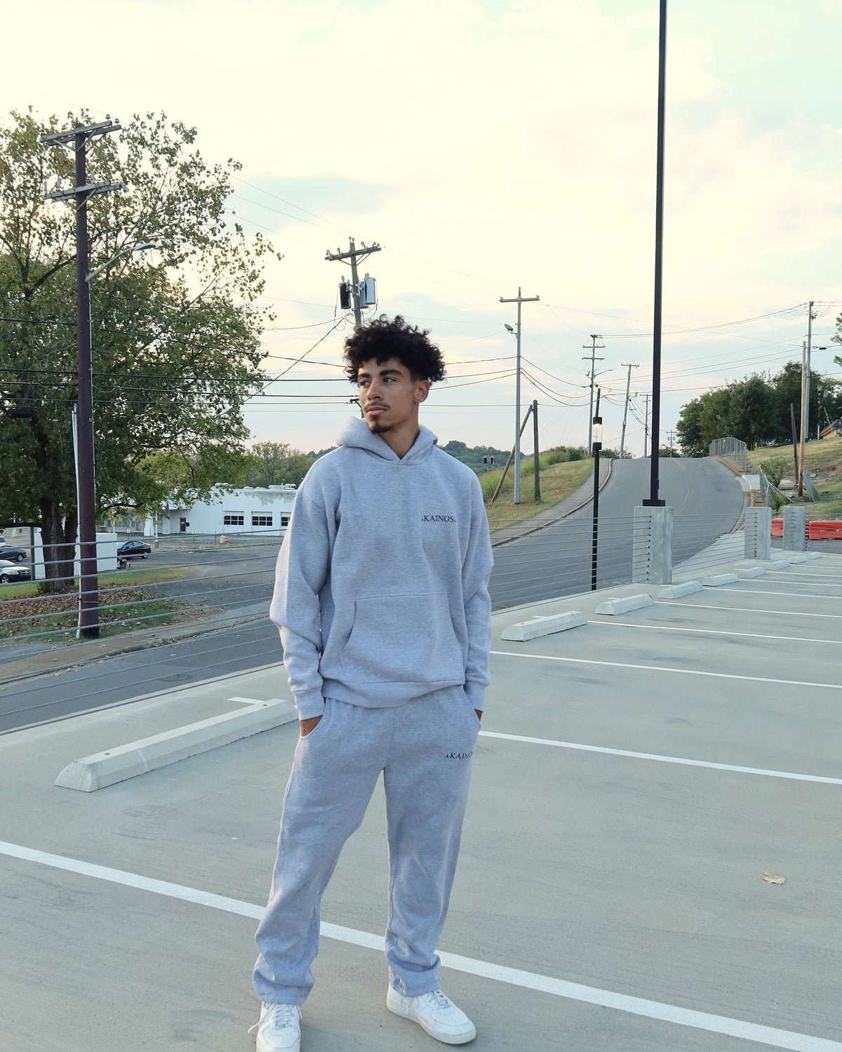 NEW CREATION hoodie in heather grey, worn