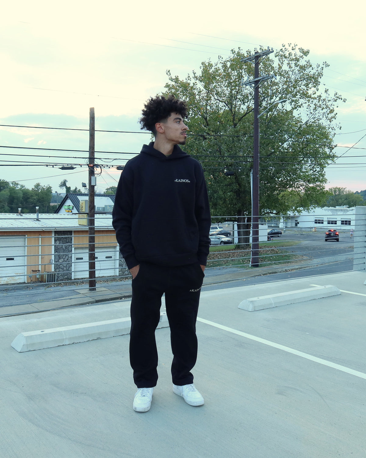 NEW CREATION hoodie in black, worn